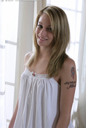 18 tear old schoolgirl Tiff Bannister takes selfies while disrobing in bedroom